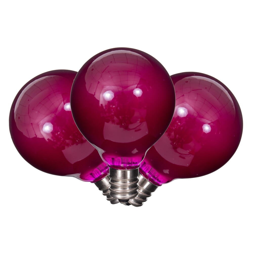 Three purple G40 LED filament glass replacement bulbs with silver screw bases.