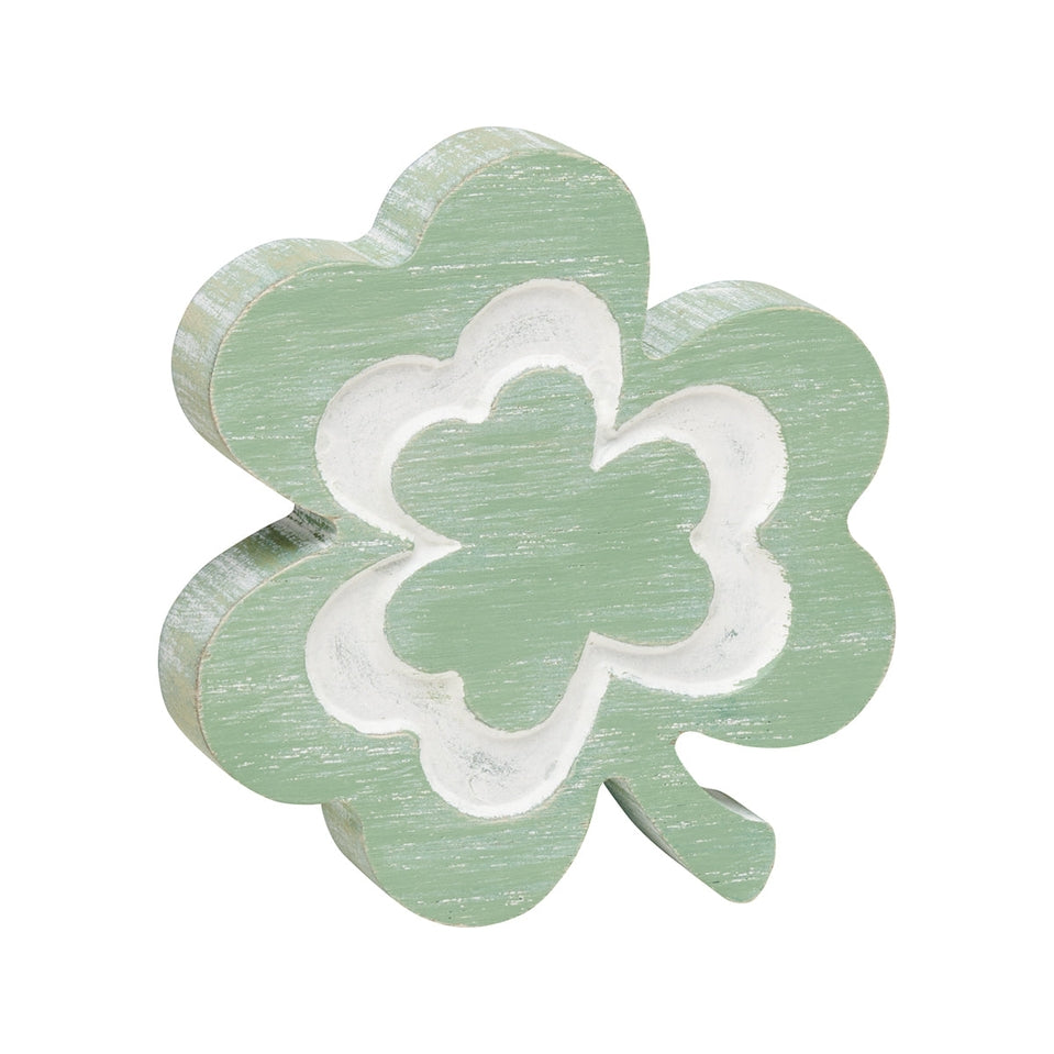 Green carved shamrock ornament with white washed wood accents
