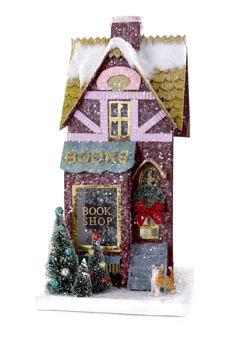 Cardboard book-shaped decoration measuring 6.5 inches wide by 8.25 inches deep.