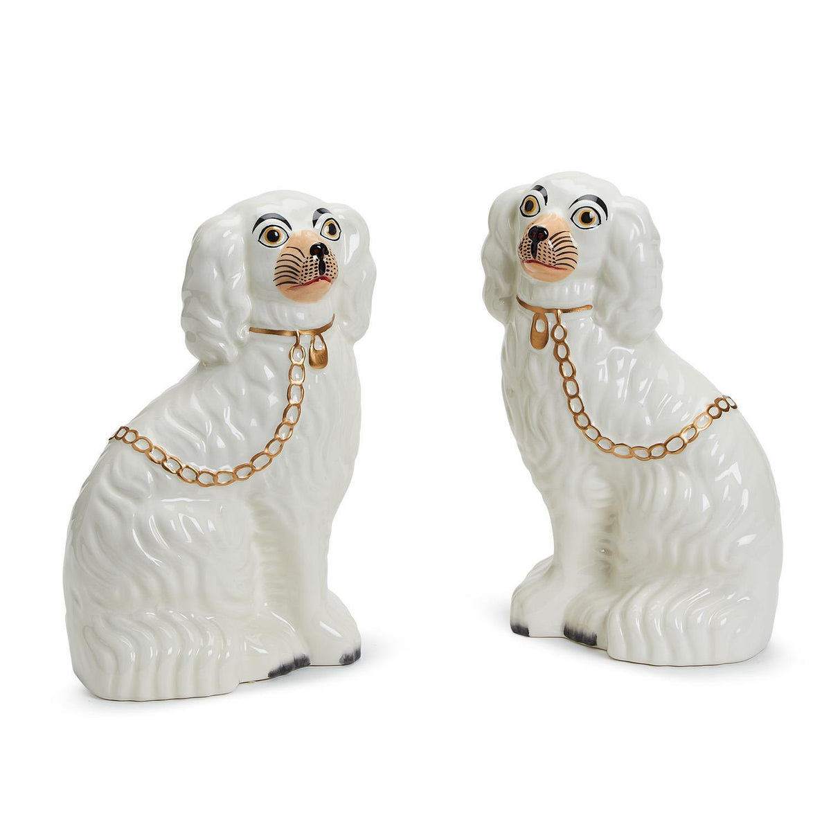 White ceramic Staffordshire dog statue with a classic standing silhouette.