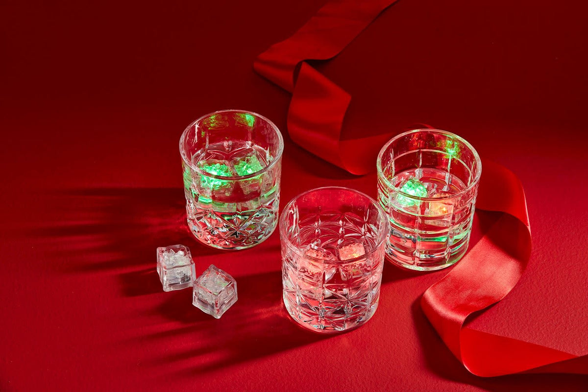 LED light-up ice cube with water-activated plastic material in clear color.