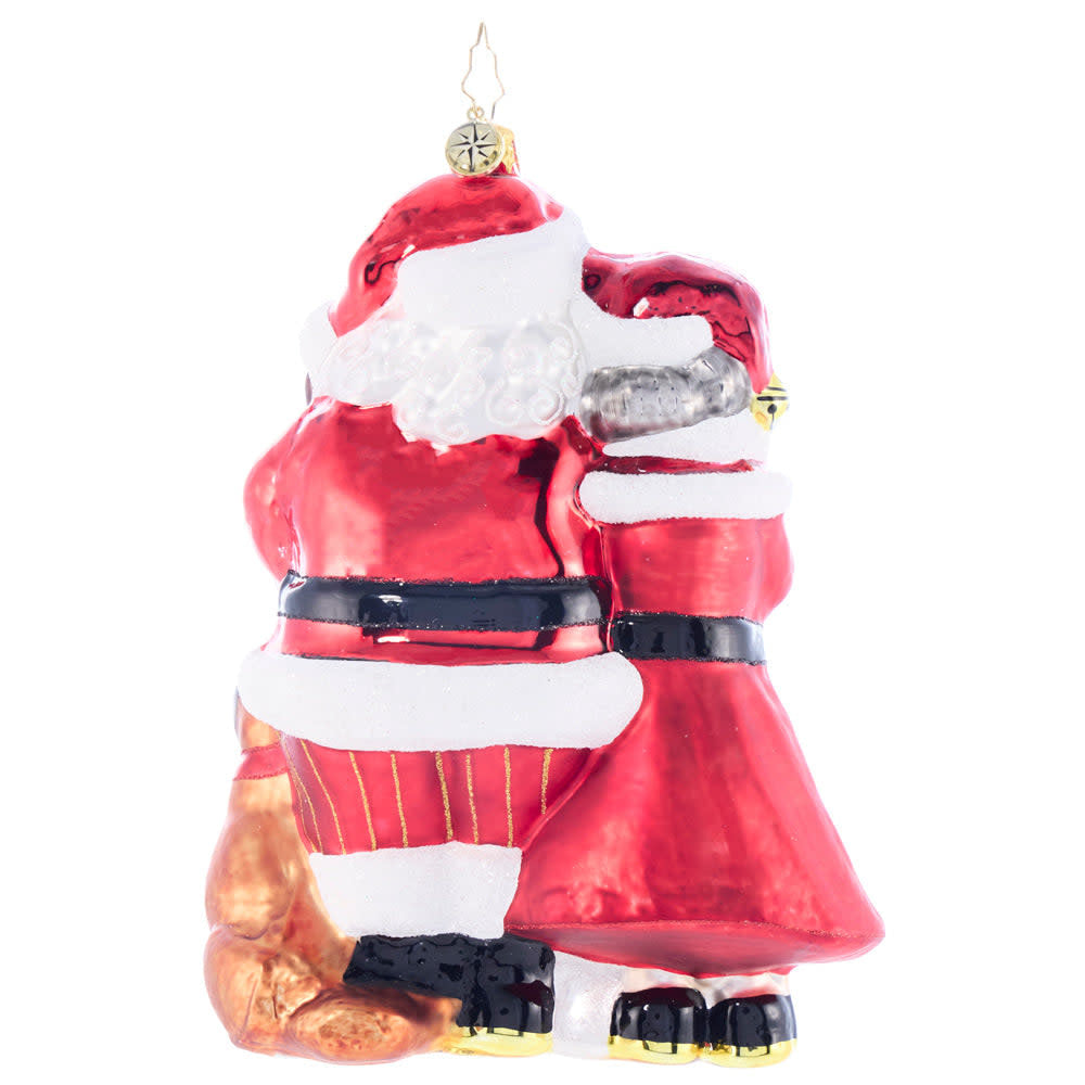 Holiday Paws ornament shaped like a dog wearing Santa hat with red and white striped collar