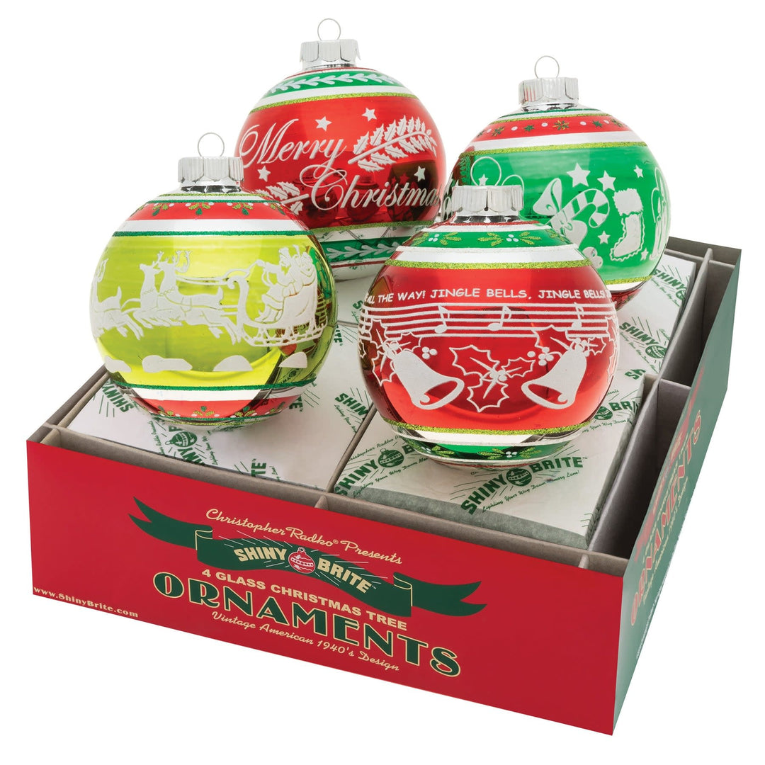 Four colorful glass Christmas ornaments in a branded box with vintage holiday designs.