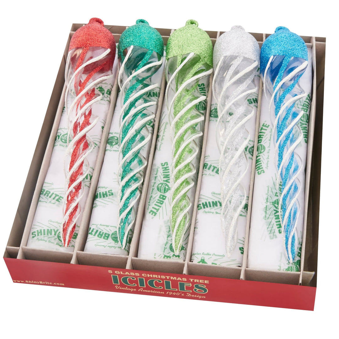 Five vintage-style glass icicle ornaments in holiday splendor colors with glittering finish.