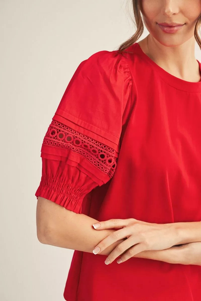 Madison top in solid fabric mix with lace contrast accent on puff sleeves.