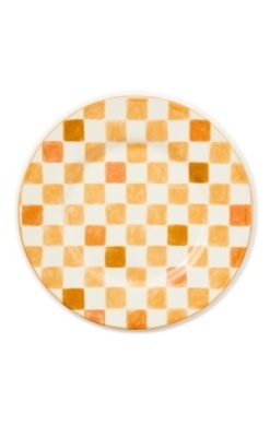 Honey-colored stoneware dinner plate with a checkered pattern.
