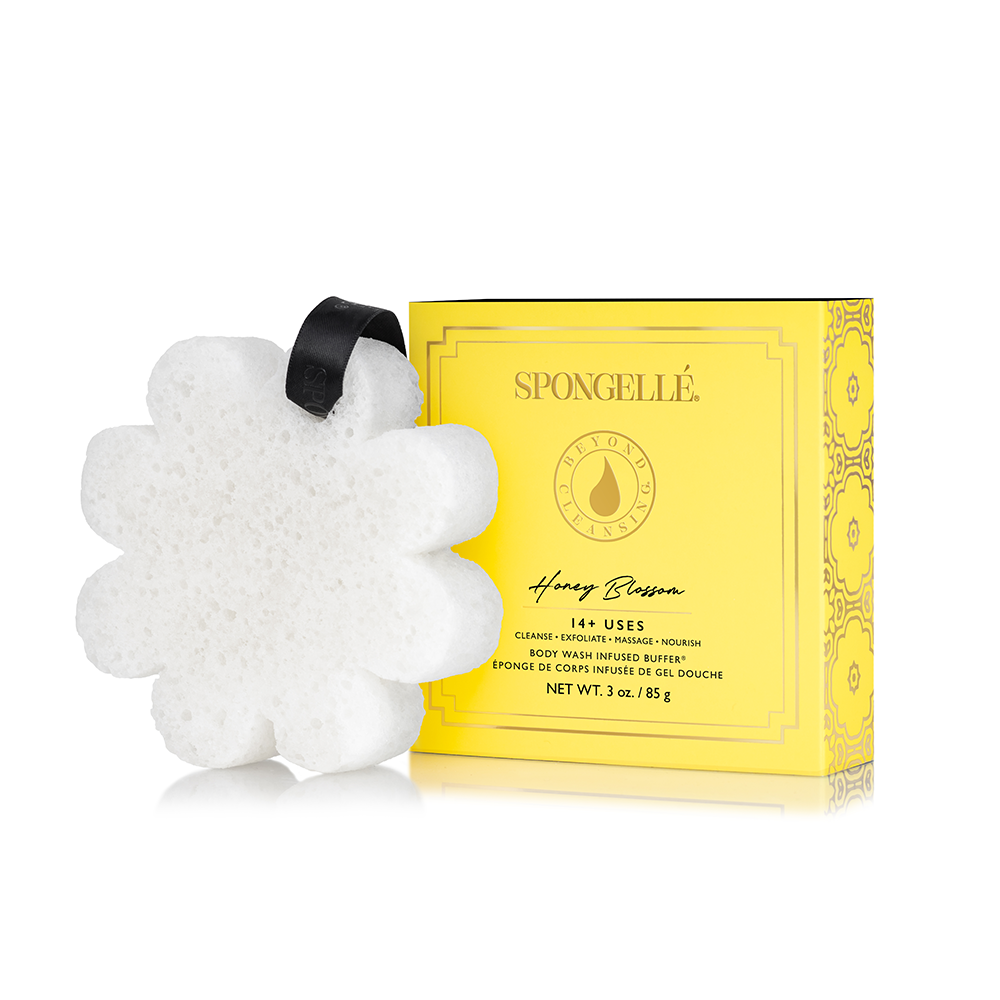 Honey-colored bath sponge with a hanging ribbon loop