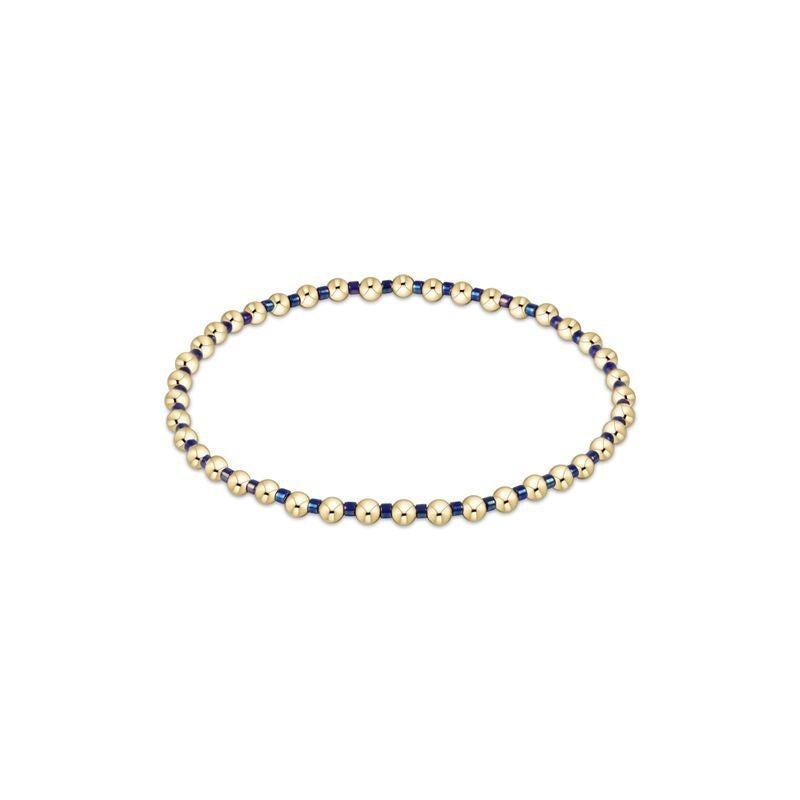 Hope Grateful bracelet featuring mixed blue metallic seed beads on stretch elastic.