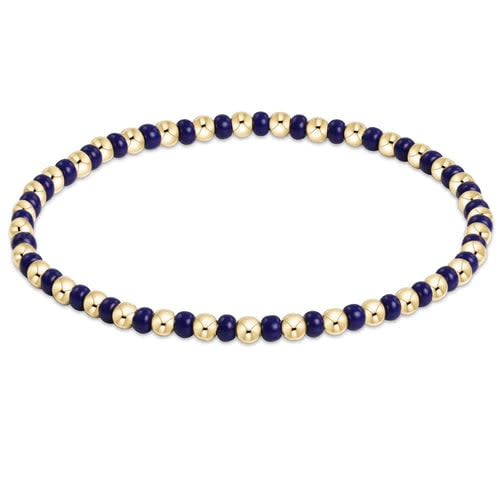 Hope Grateful bracelet featuring navy seed beads with gold-filled accents on elastic cord.