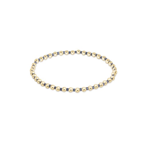 Hope Grateful bracelet featuring slate blue seed beads with gold-filled accents on elastic cord.