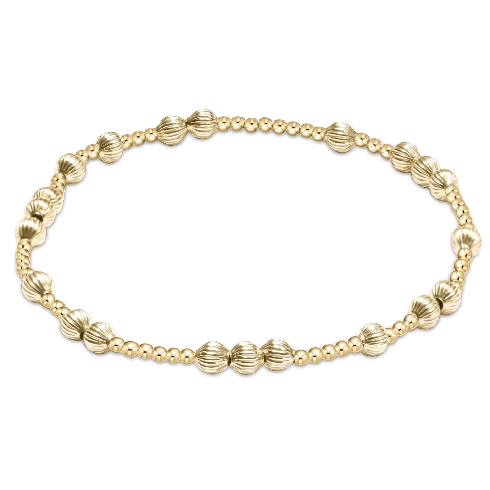 Gold-filled beaded bracelet featuring 4mm dignity beads on high-performance elastic.