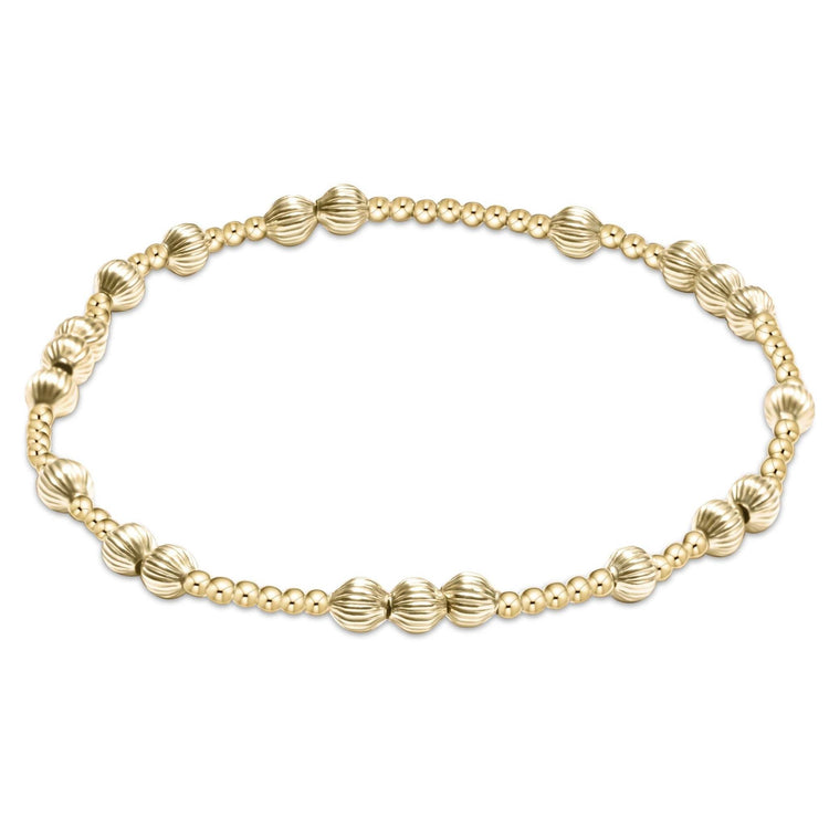 Gold-filled beaded bracelet featuring 4mm dignity beads on high-performance elastic.