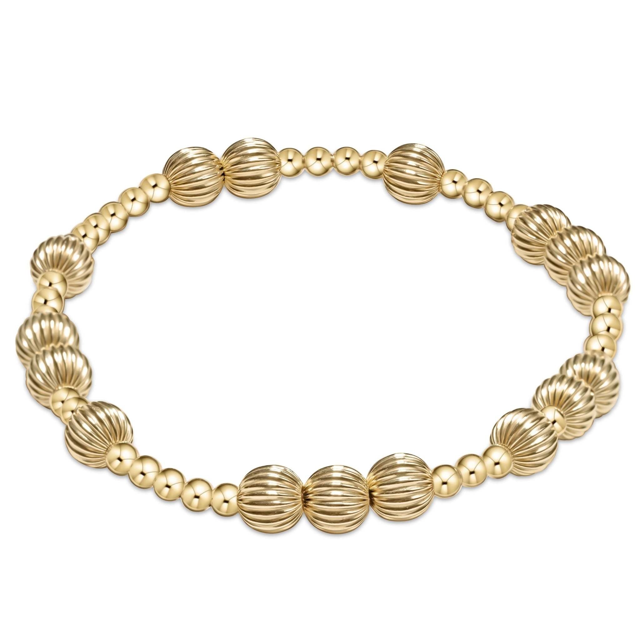 Hope Unwritten Dignity bracelet featuring 6mm gold-filled beads on stretch elastic cord.
