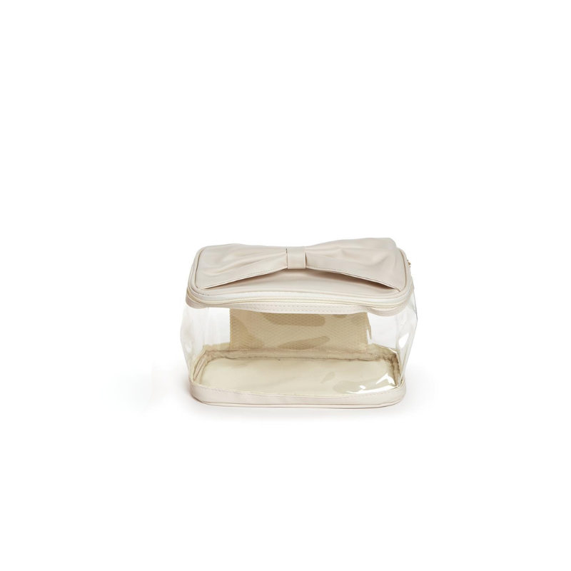 Clear cosmetic and toiletry carry case with a cream-colored bow accent on the lid.