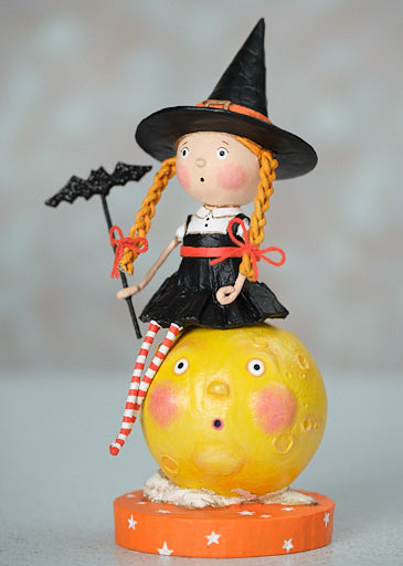 Mischief on the Moon by Lori Mitchell figurine featuring a witch girl sitting on a yellow moon.