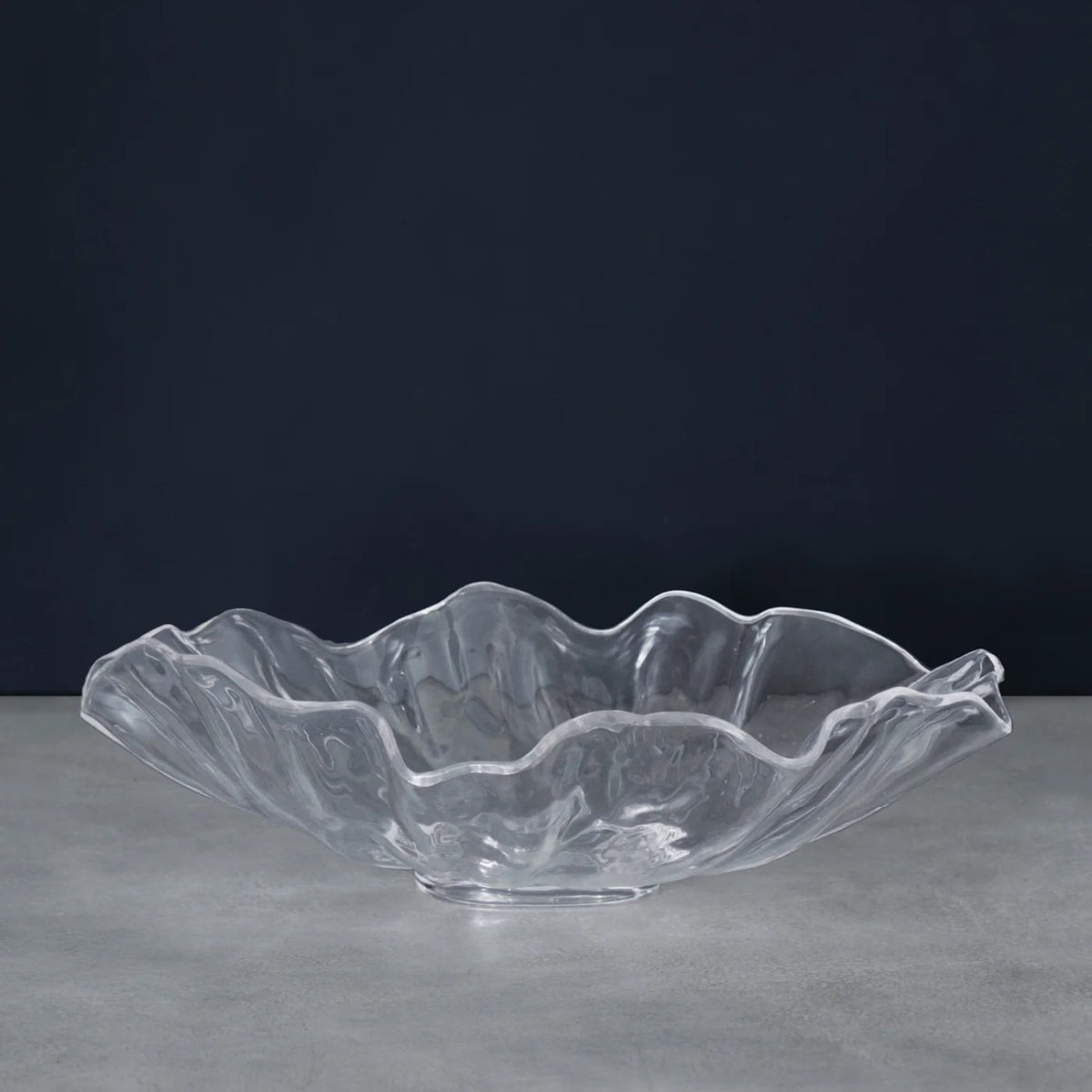 Clear acrylic large bowl with a bloom-shaped rim designed for indoor or outdoor table use.
