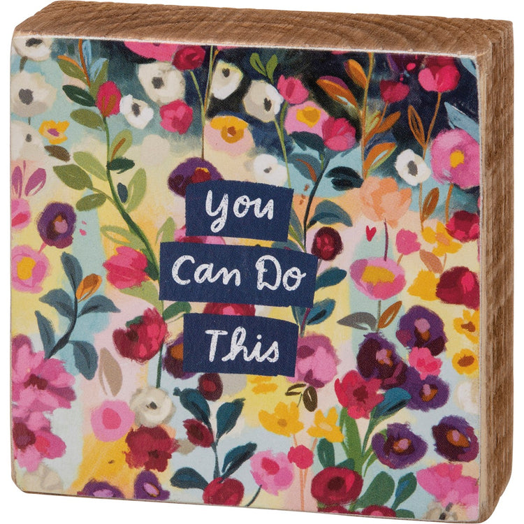 Wooden block sign with floral pattern and the text "you can do this" in navy blue.