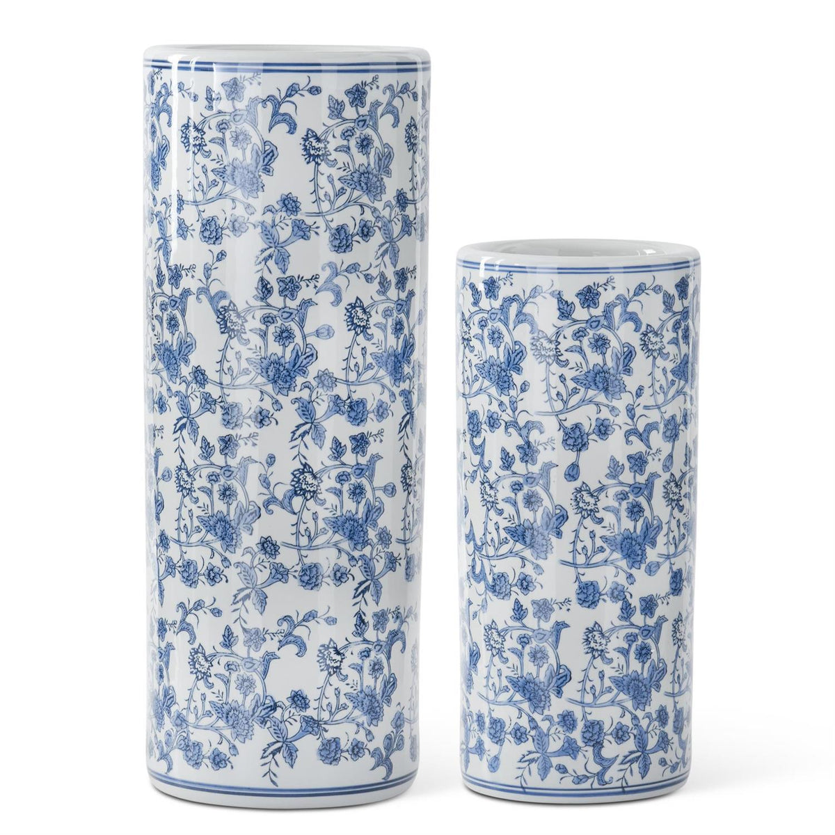 Blue and white ceramic cylinder vase with chinoiserie floral patterns.