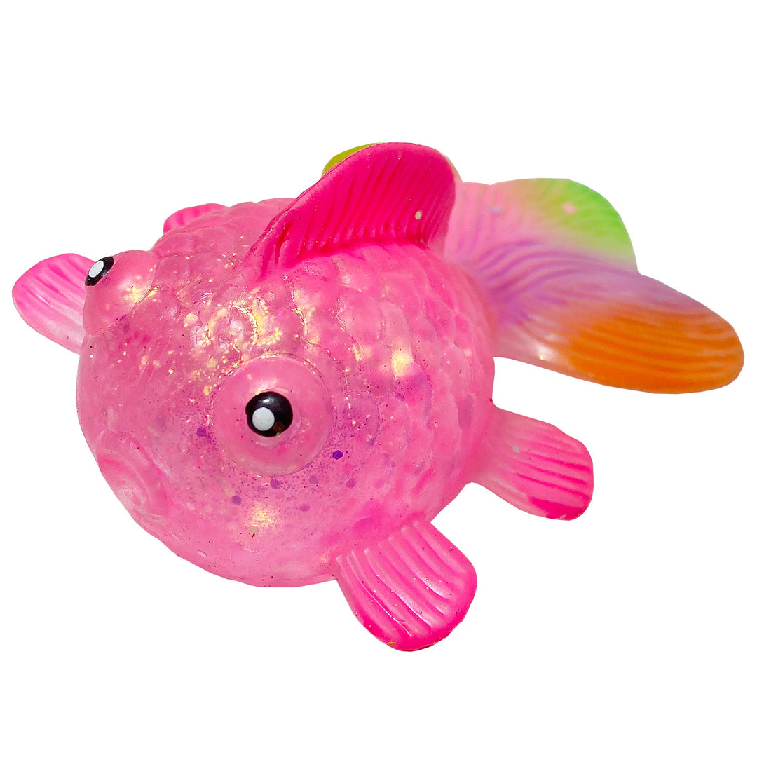 Squishy goldfish toy made of pectin with a translucent yellow color and rounded silhouette.