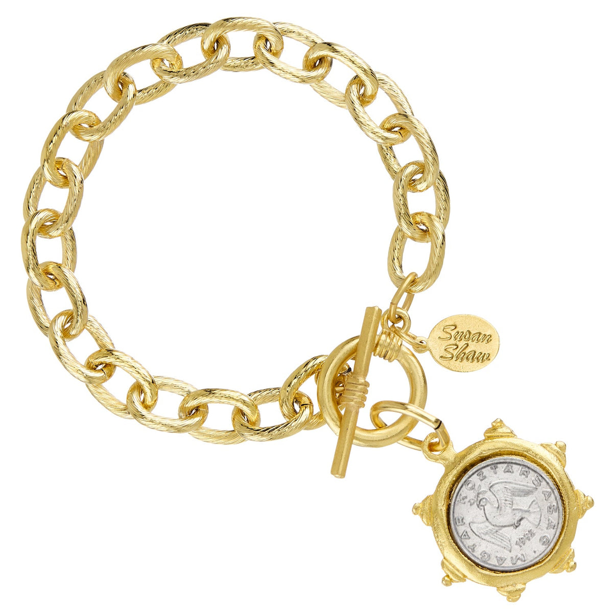 Gold chain toggle bracelet with a silver dove coin pendant and a Susan Shaw brand tag.