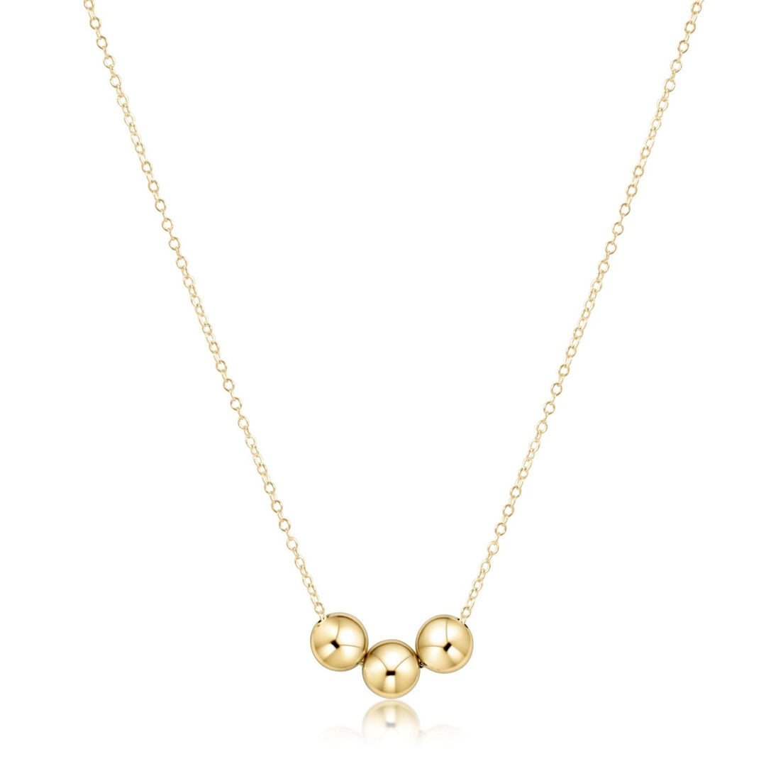 16-inch 14kt gold-filled chain necklace featuring three 6mm gold beads at the center.