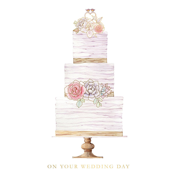Watercolor wedding card featuring a three-tier cake with floral and bird toppers, on a wooden stand.