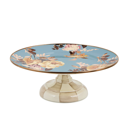 Small pedestal platter with a blue floral top and a checkered beige and white base.