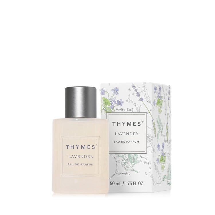 Thymes Lavender Eau de Parfum bottle and box with floral illustrations. The bottle is clear with a silver cap.