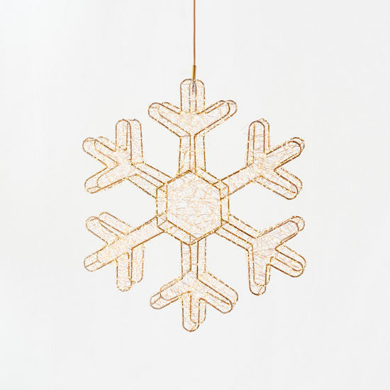 98.5-inch lighted snowflake display with a warm gold wire frame and internal LED lights.