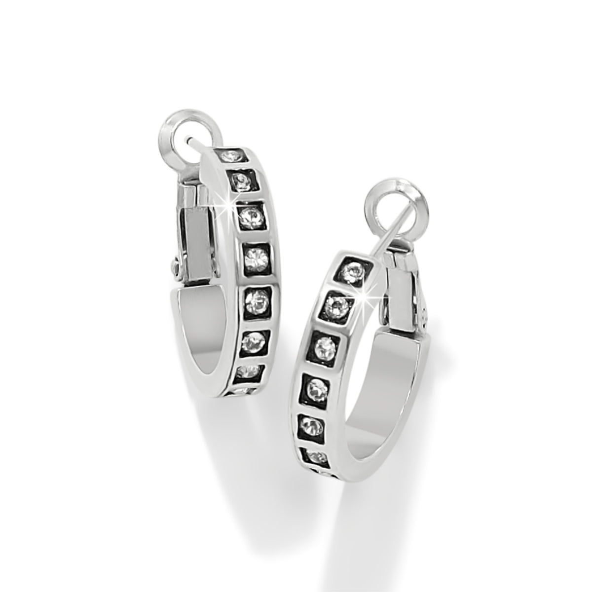 Silver plated hoop earrings featuring fine quality crystals with a lever back post.