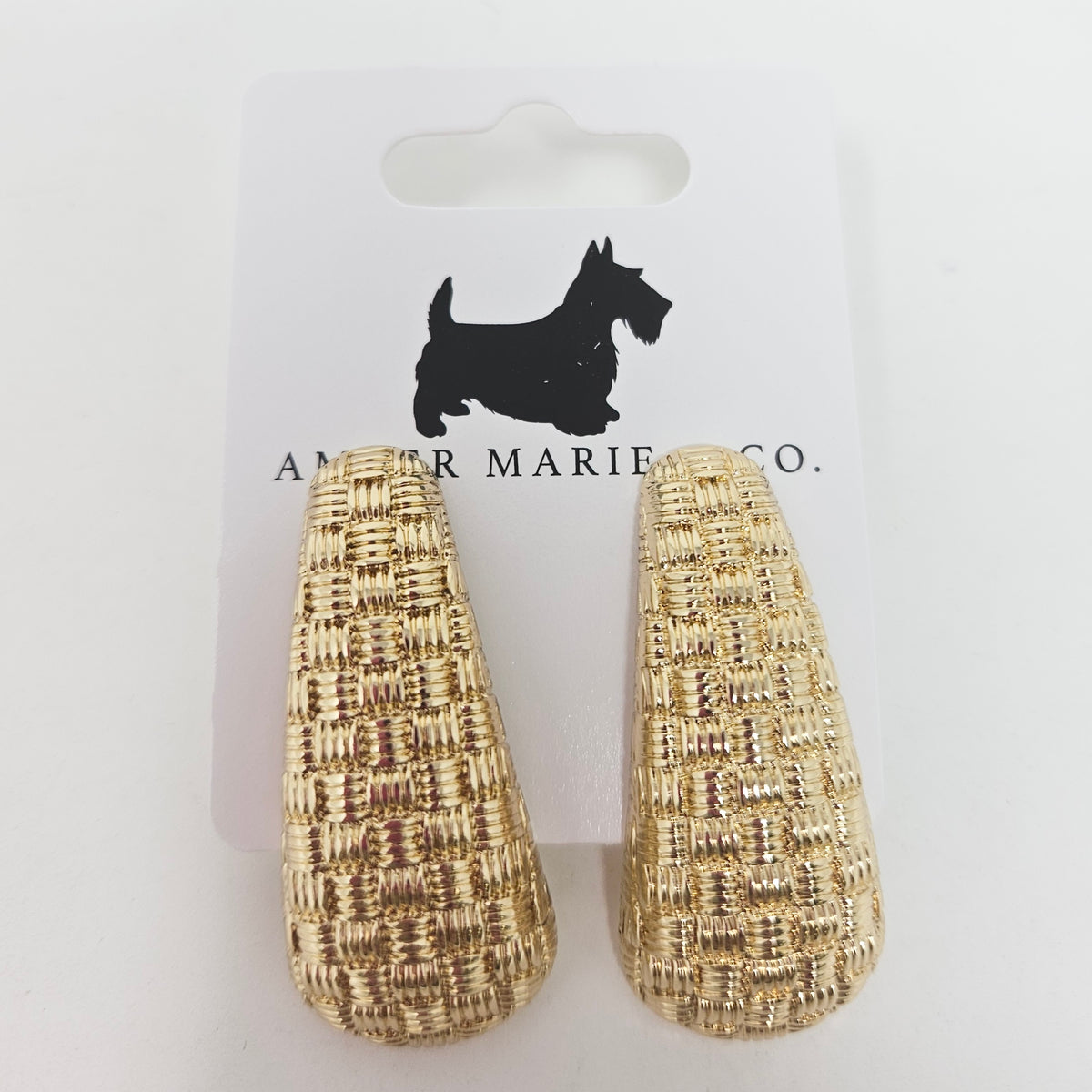 Gold-plated teardrop charm earrings with a checked pattern on the front.