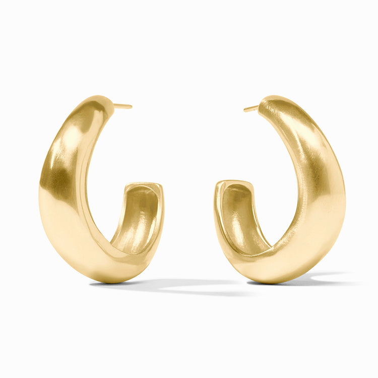 Curvaceous golden Wave Hoop earrings with open interiors in medium size.