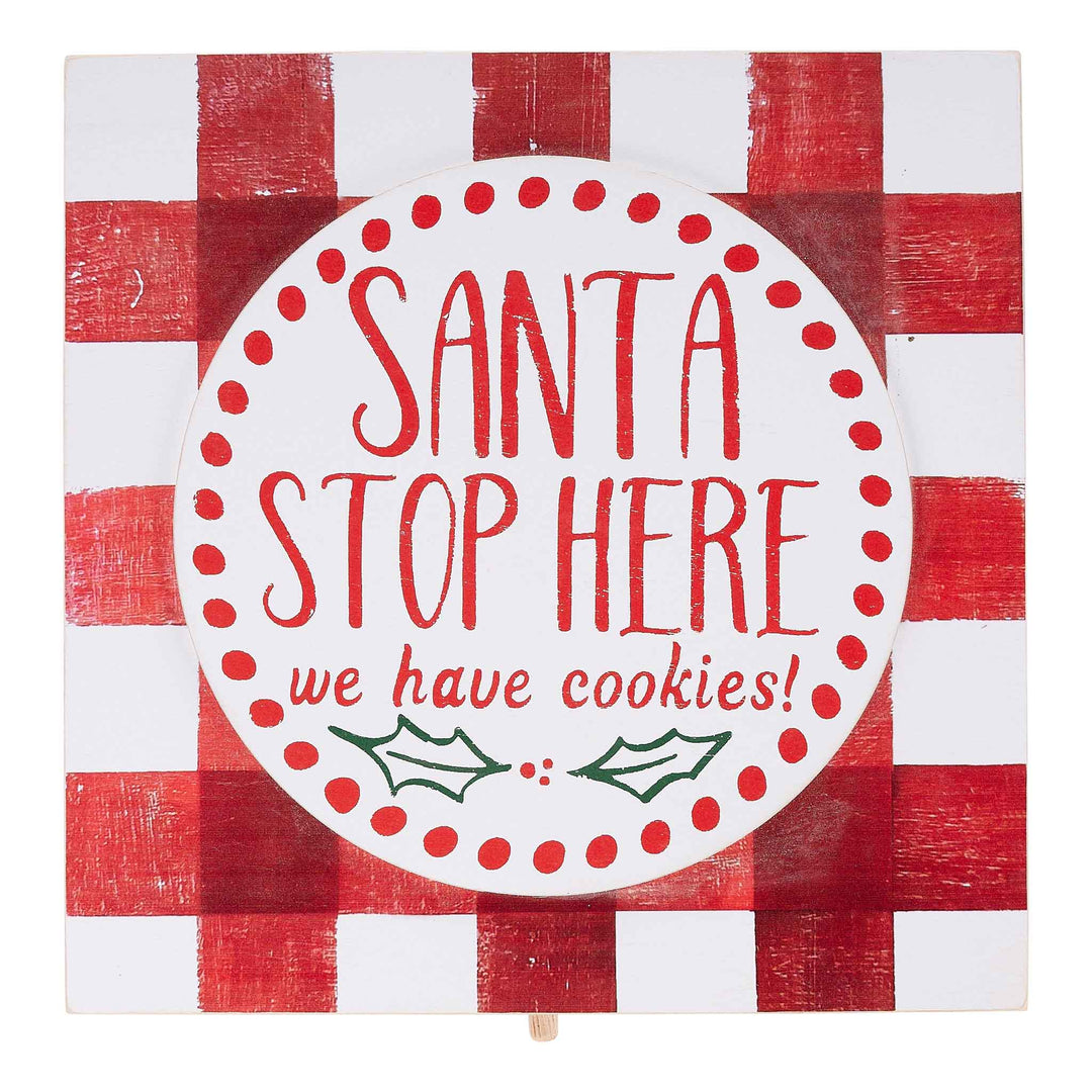 Square wooden topper with a red Santa Claus figure waving from a green sleigh silhouette.