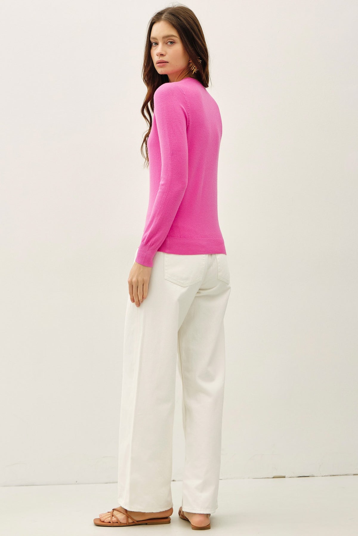 Relaxed fit Harper crew neck sweater in solid soft knit fabric with ribbed cuffs and hem.
