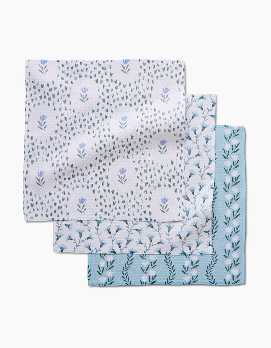 Set of three waffle weave dishcloths in recycled polyester with single-sided prints and hang loops.