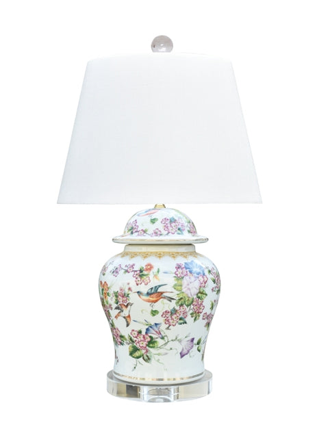 Porcelain Famille Rose temple jar table lamp with a warm amber glow