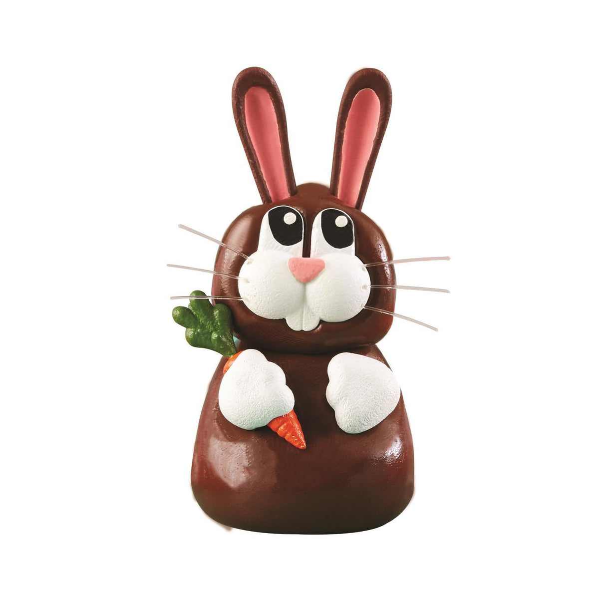 Chocolate bunny with pink ears, holding a carrot and green leaves.