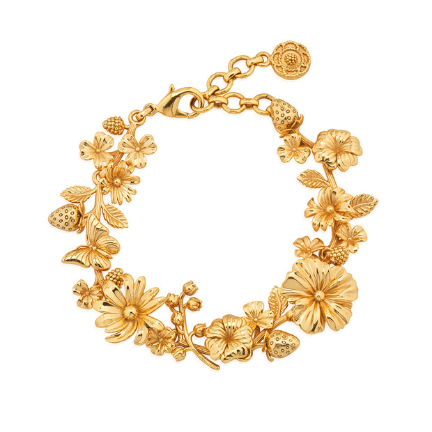 Gold-plated Meadow Bouquet link bracelet featuring intricate wildflowers, berries, and butterflies.