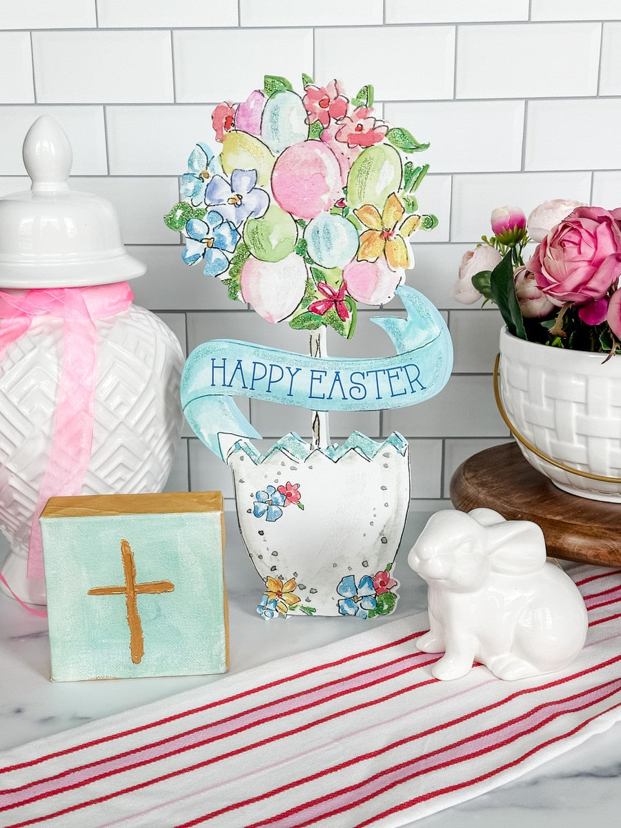 Beck's Happy Easter Egg Topiary stake in green plastic with a white egg silhouette and pastel floral accents.