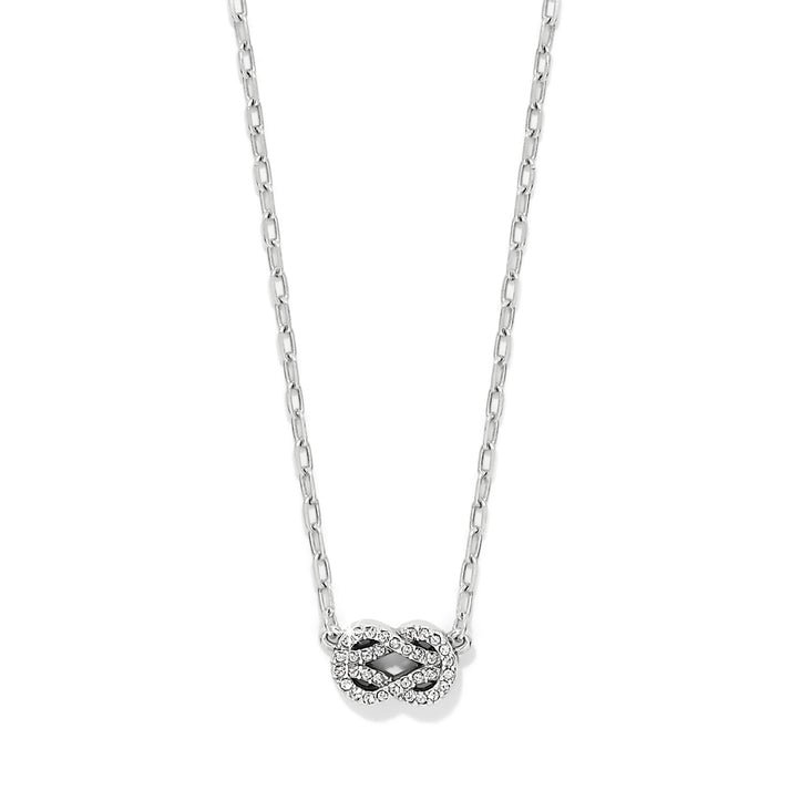 Interlok Harmony Luxe Petite Necklace featuring a silver-plated infinity knot pendant with crystals.