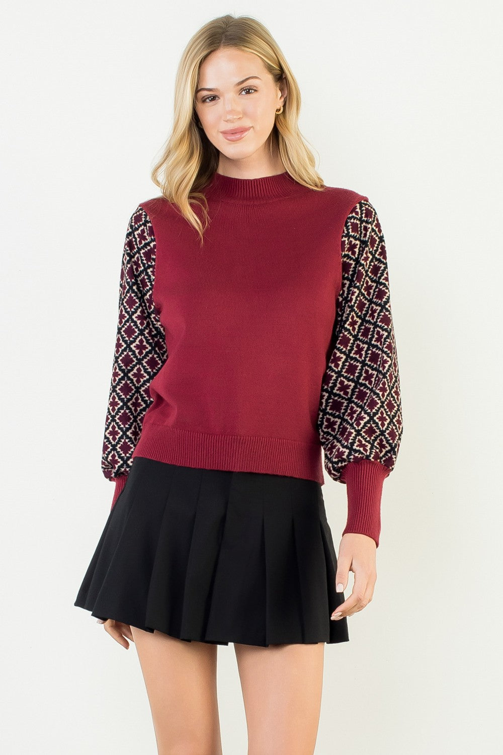 Hannah Mixed Media knit top in a soft neutral tone with a relaxed silhouette.
