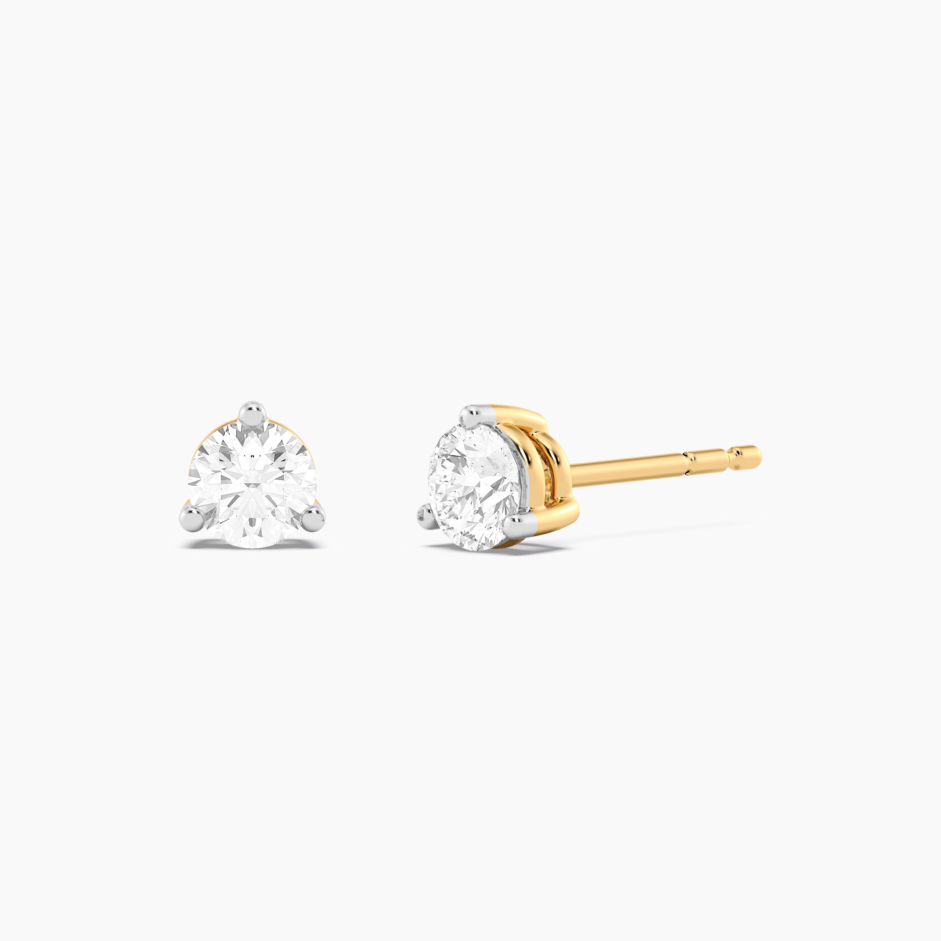 Three-prong lab-grown diamond stud earrings in silver with gold-plated finish