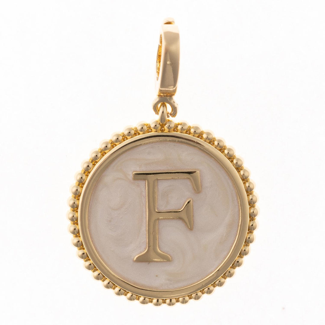 Madison Initial Charm with 18k gold plating, letter F, and faux mother of pearl inlay.