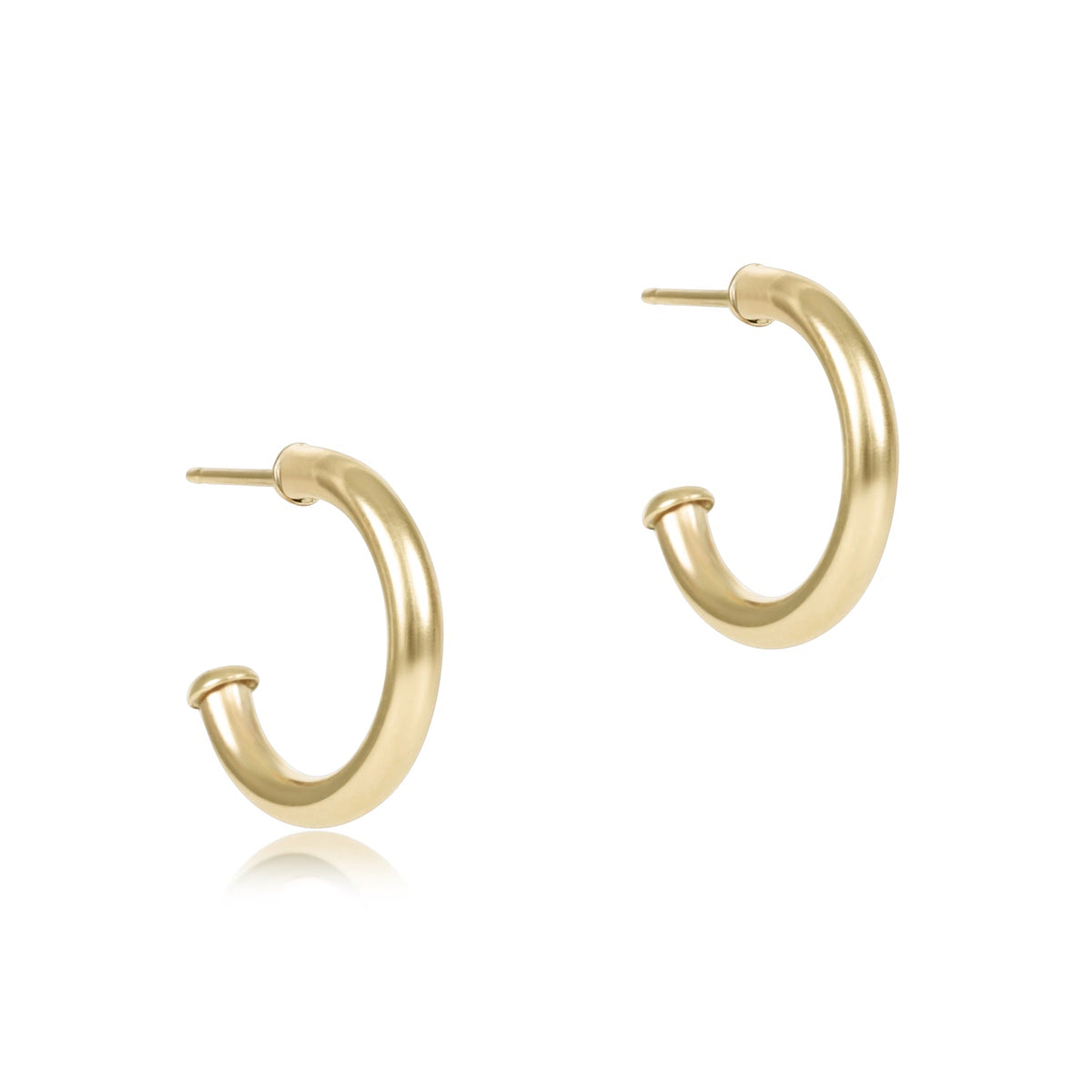 Round gold hoop earring with a smooth finish