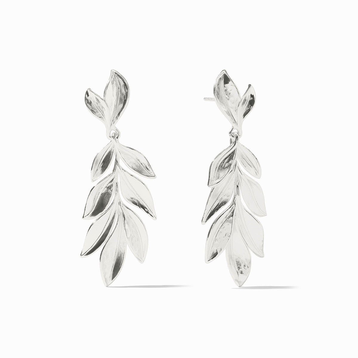 Willow Statement Earring in gold-tone metal with a long, flowing willow branch silhouette and dangling leaf details.