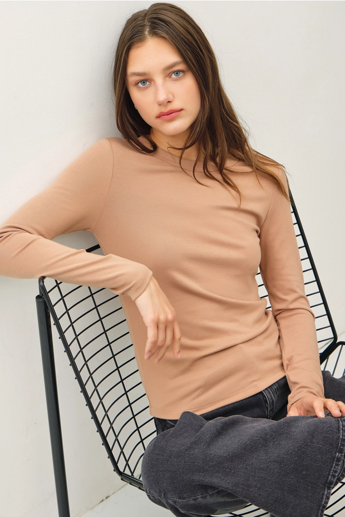 Audrey round neck long sleeve knit top in soft stretchy material with relaxed slim fit silhouette.