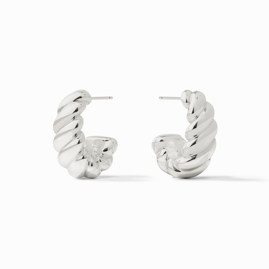 A pair of silver Ravello Statement Hoop earrings with a thick, twisted croissant-style design.