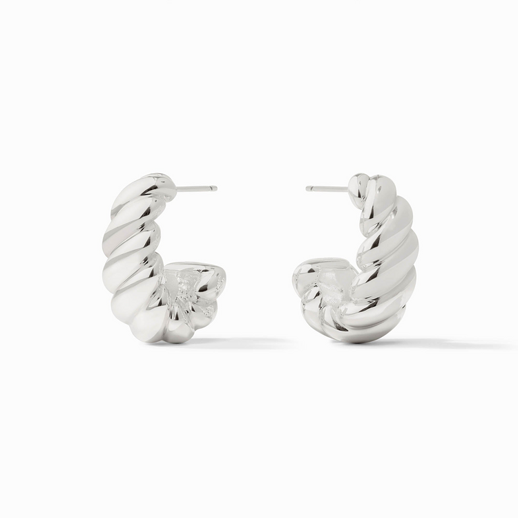 A pair of silver Ravello Statement Hoop earrings with a thick, twisted croissant-style design.
