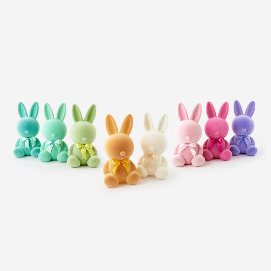 Large flocked sitting bunny figurine with a textured white finish.
