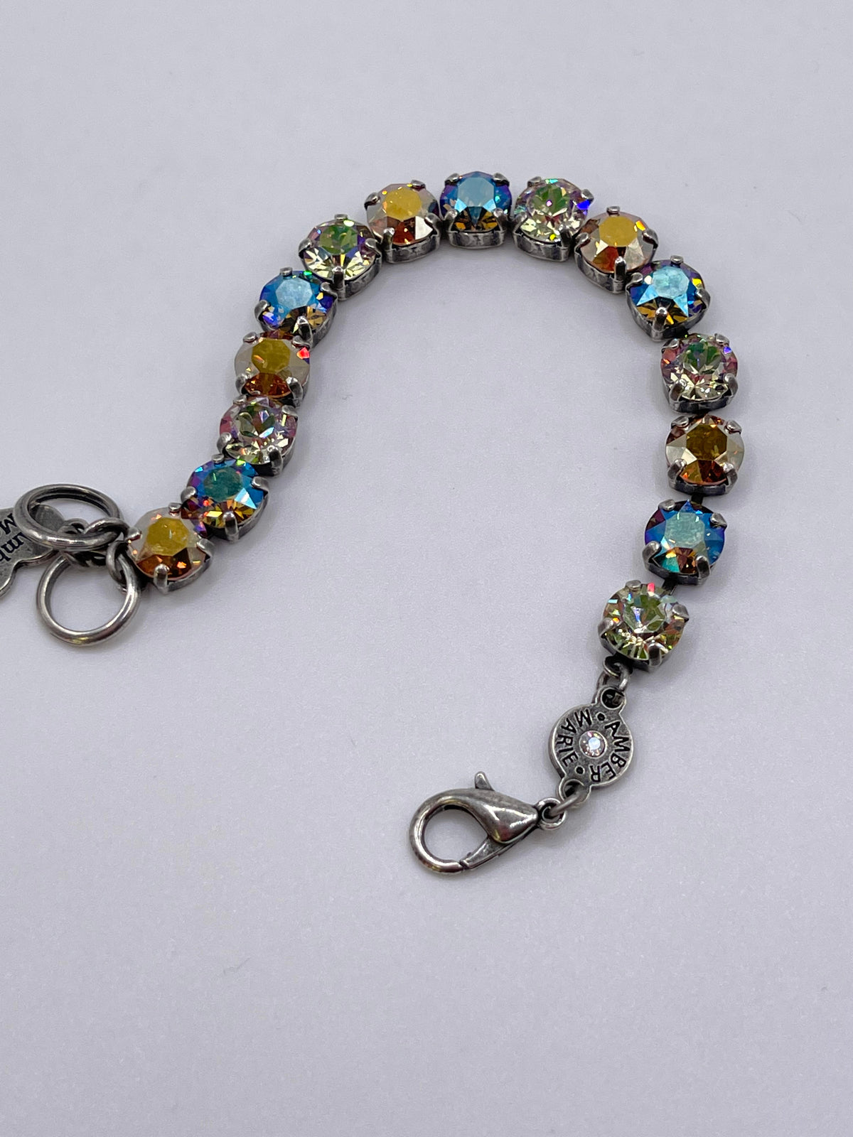 Classic Bracelet in Istanbul featuring dark blue, brown, and gold tones with a geometric pattern.